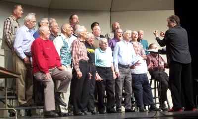 In 
this shot we are really Singin' our hearts out!, wrapping up the end of a song with heartfelt 
emotion.